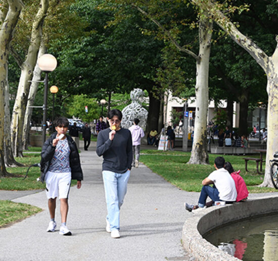 students eating ice cream near chapel