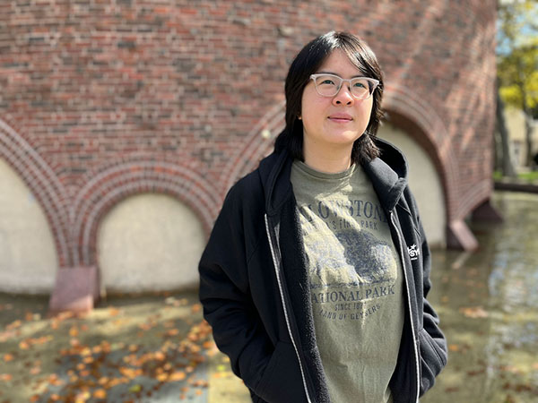 Angeline Peng standing in front of the MIT Chapel